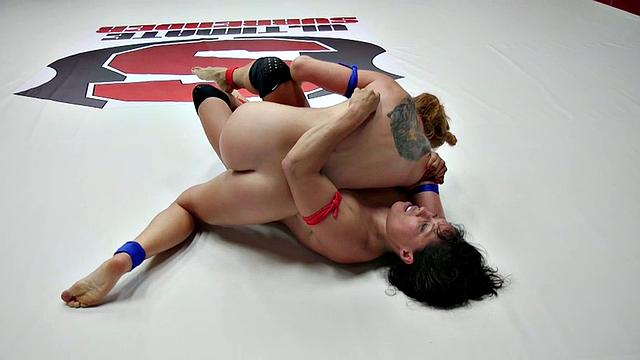 Asian lez wrestler dominated by rival in fight