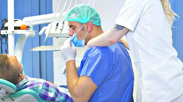 Naughty blonde nurse with perky tits gets her bald pussy drilled by the dentist