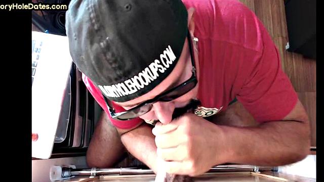 Gloryhole DILF deepthroats black cock in homemade video