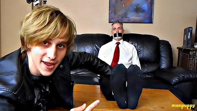 Elis Ataxxx tickles Richard Lennox's feet and gets playful with his professor