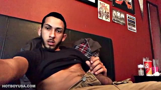 Brian Bonerz starts off in bed, with pants pushed down just enough to release his big stiff cock and balls. He starts stroking and then pauses briefly to remove one of the two shirts he's wearing.