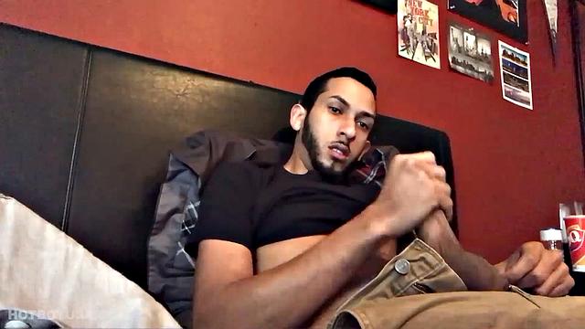 Brian Bonerz starts off in bed, with pants pushed down just enough to release his big stiff cock and balls. He starts stroking and then pauses briefly to remove one of the two shirts he's wearing.