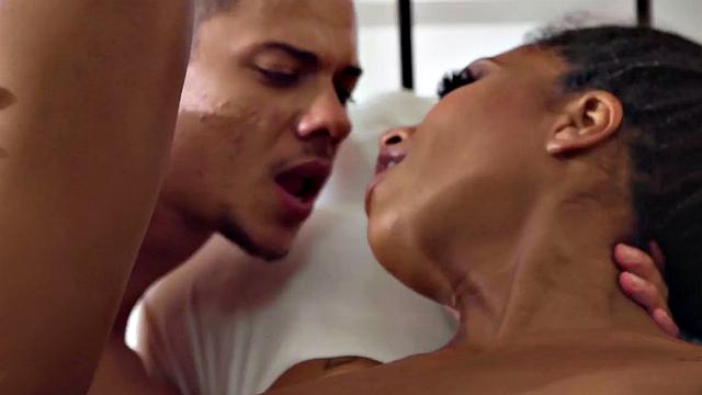 Black huge boobed babe gets banged good and hard on the bed