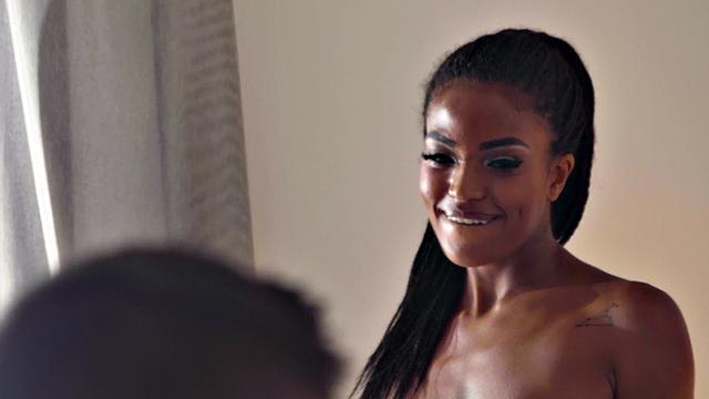 Black huge boobed babe gets banged good and hard on the bed