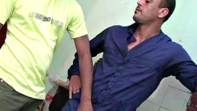 Gomez Aguilar is in his tool shed, upset that he hasn't used his large dick in a while, so Luis de Pavia agrees to help him out. He takes off the one-piece to reveal Gomez's muscles and obscenely large cock, and sucks it valiantly.