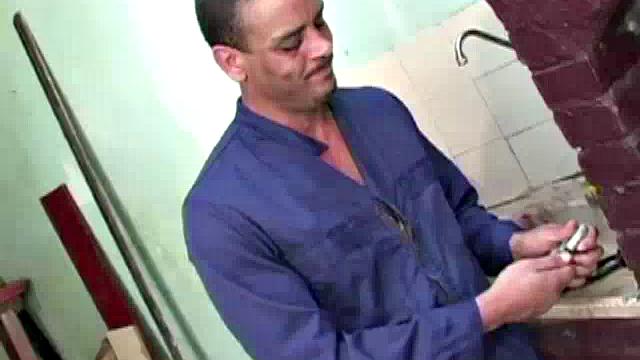 Gomez Aguilar is in his tool shed, upset that he hasn't used his large dick in a while, so Luis de Pavia agrees to help him out. He takes off the one-piece to reveal Gomez's muscles and obscenely large cock, and sucks it valiantly.