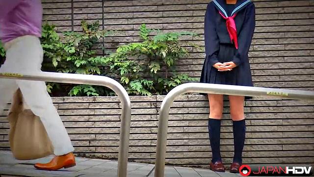 Fu Sazanami puts on an old uniform