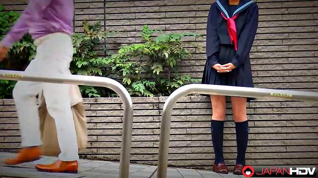 Fu Sazanami puts on an old uniform