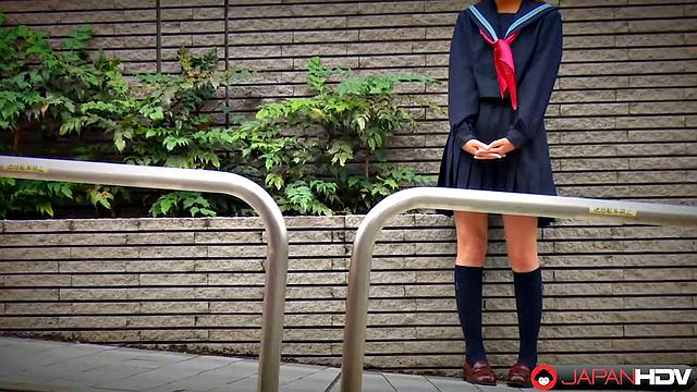Fu Sazanami puts on an old uniform