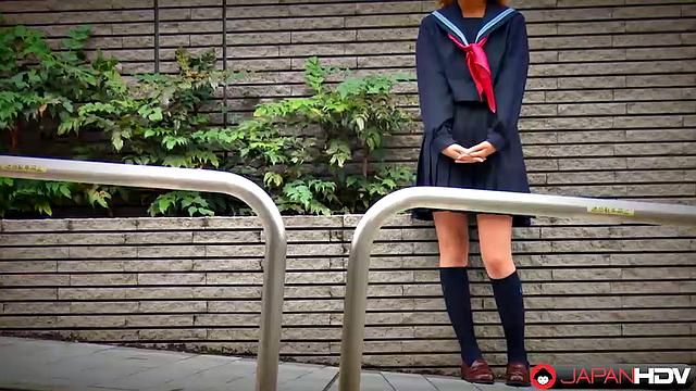 Fu Sazanami puts on an old uniform