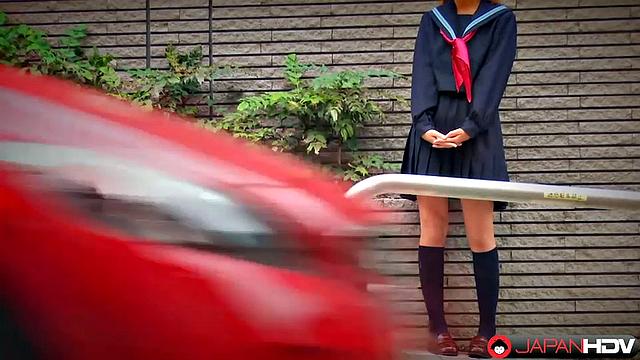 Fu Sazanami puts on an old uniform