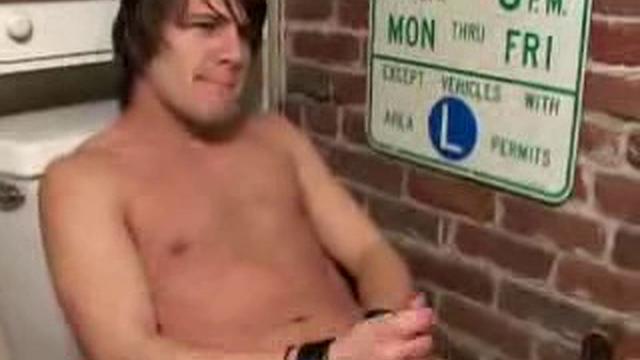 While he's checking out some magazine in the bathroom, Alex West strips down and starts jerking off. He works his with determination, and edges himself a few times, before pumping out a big nut.