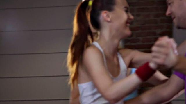 Gym babes sucking and riding trainer in threesome