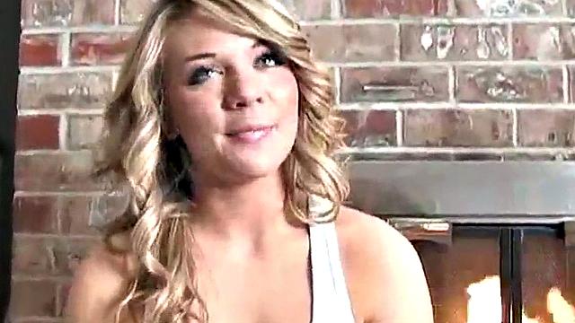 Sexy blonde dripping wet as she soaks her shirt