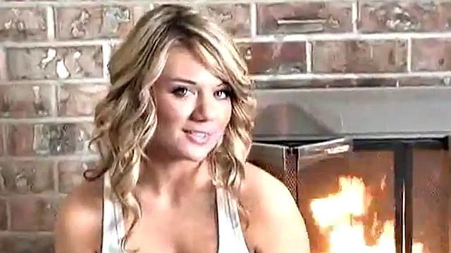 Sexy blonde dripping wet as she soaks her shirt