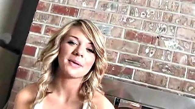 Sexy blonde dripping wet as she soaks her shirt