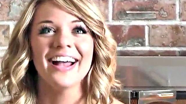 Sexy blonde dripping wet as she soaks her shirt