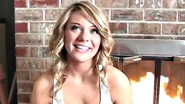 Sexy blonde dripping wet as she soaks her shirt