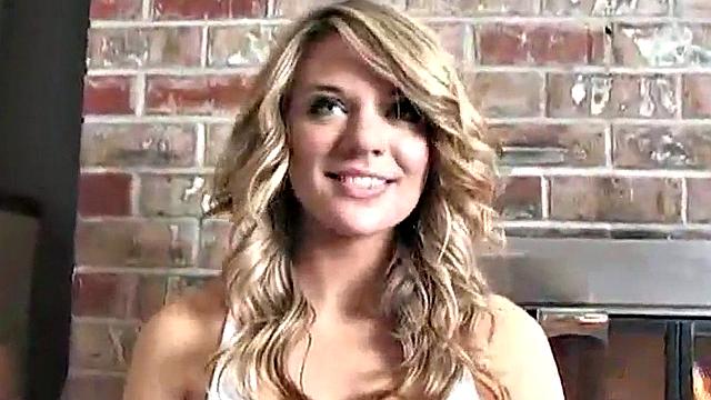 Sexy blonde dripping wet as she soaks her shirt