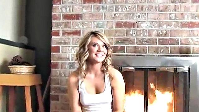 Sexy blonde dripping wet as she soaks her shirt