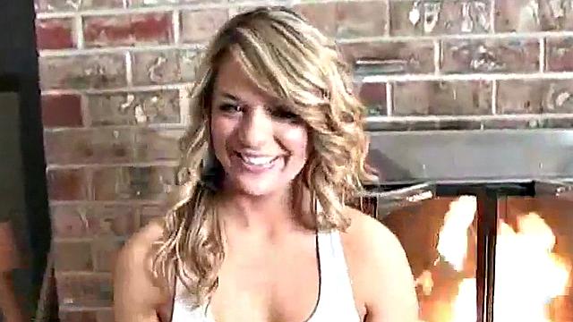 Sexy blonde dripping wet as she soaks her shirt