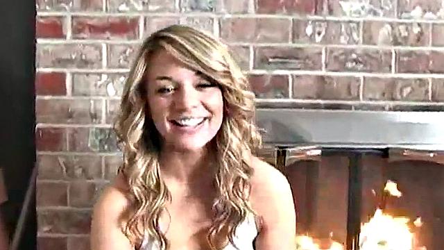 Sexy blonde dripping wet as she soaks her shirt