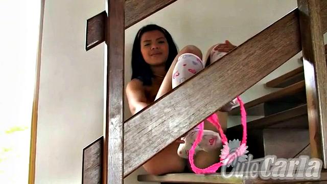 Sexy Carla fingering her tight pussy upstair in her homemade thong & long socks