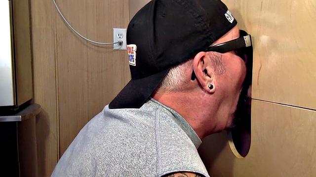 Inked mature mouth spermed after gloryhole blowjob