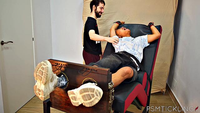 horny gay stud begs for a sensual tickling session on the couch