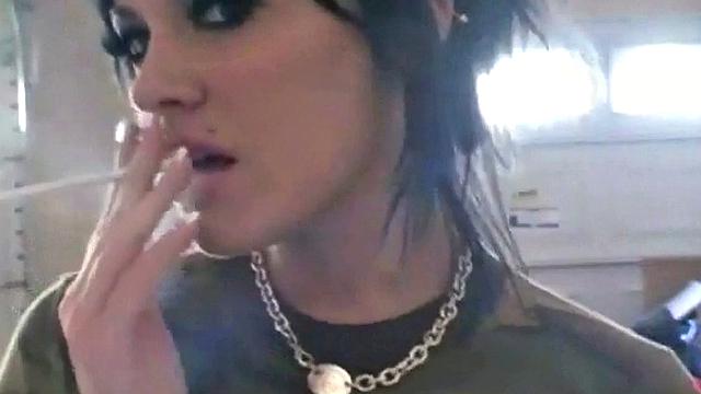 Hot teen Andi smoking in the loo on the sly