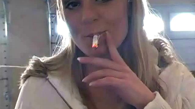 Hot teen Andi smoking in the loo on the sly