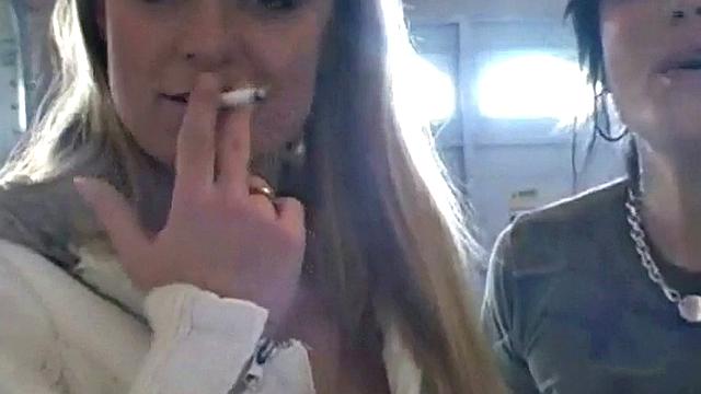 Hot teen Andi smoking in the loo on the sly