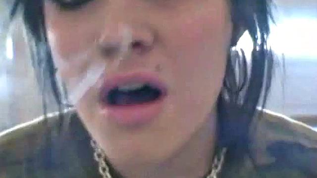 Hot teen Andi smoking in the loo on the sly