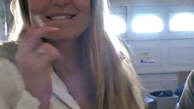 Hot teen Andi smoking in the loo on the sly