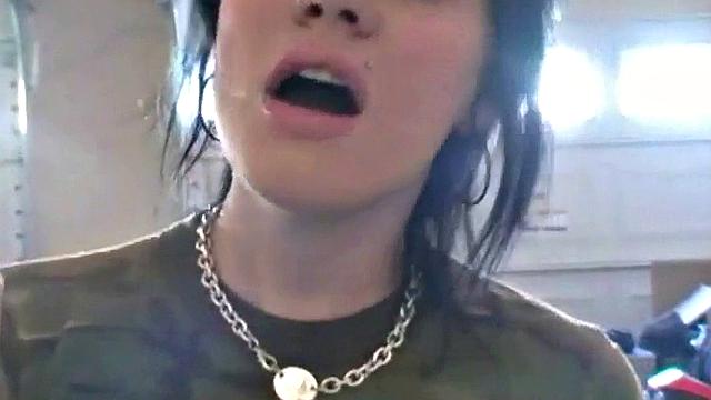 Hot teen Andi smoking in the loo on the sly