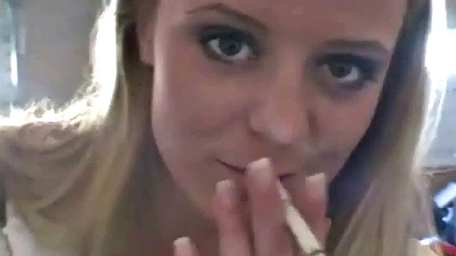 Hot teen Andi smoking in the loo on the sly