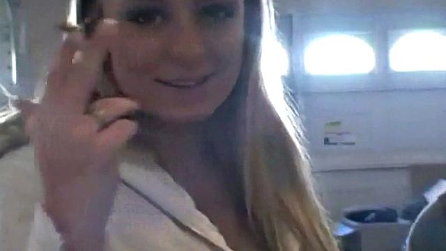 Hot teen Andi smoking in the loo on the sly