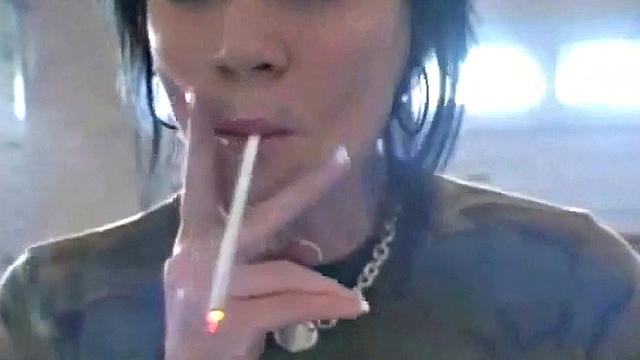 Hot teen Andi smoking in the loo on the sly
