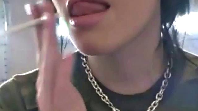 Hot teen Andi smoking in the loo on the sly