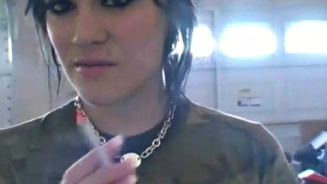 Hot teen Andi smoking in the loo on the sly