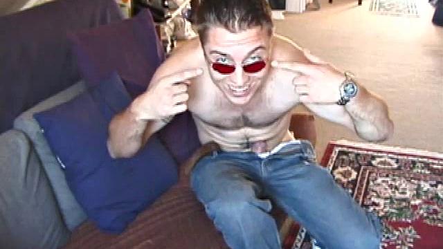 Johnny is back and this time he' swearing a preppy polo shirt and shades. He quickly settles down and gets into his alone time. After oiling up his cock, Johnny strokes it while watching a porn video, and occasionally narrating.
