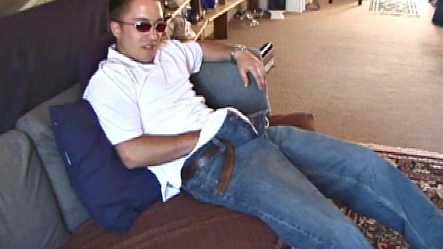 Johnny is back and this time he' swearing a preppy polo shirt and shades. He quickly settles down and gets into his alone time. After oiling up his cock, Johnny strokes it while watching a porn video, and occasionally narrating.