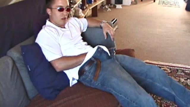 Johnny is back and this time he' swearing a preppy polo shirt and shades. He quickly settles down and gets into his alone time. After oiling up his cock, Johnny strokes it while watching a porn video, and occasionally narrating.