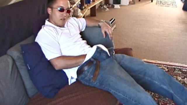 Johnny is back and this time he' swearing a preppy polo shirt and shades. He quickly settles down and gets into his alone time. After oiling up his cock, Johnny strokes it while watching a porn video, and occasionally narrating.