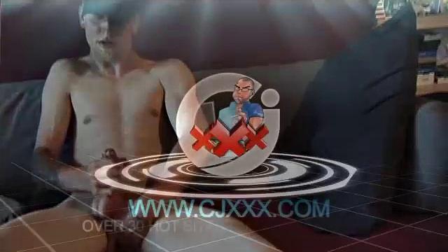 Young amateur Brandon reclines on the sofa and pulls off his pants. While watching a video, he rubs his cock hard and fingers his ass.