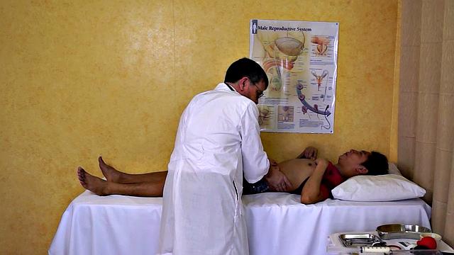 Real Asian twink gaping at doctor before enema