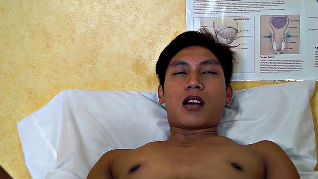 Real Asian twink gaping at doctor before enema