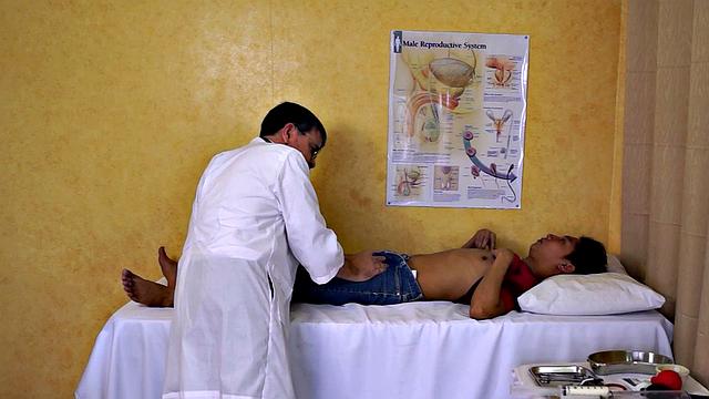 Real Asian twink gaping at doctor before enema