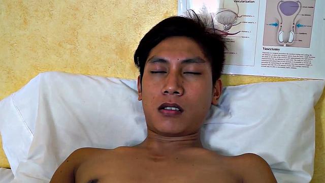 Real Asian twink gaping at doctor before enema