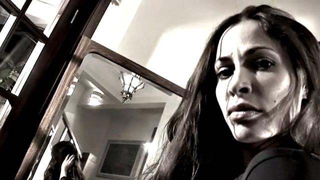 Leggy Nina does a striptease